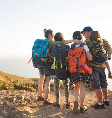 Four group of friends backpacking together
